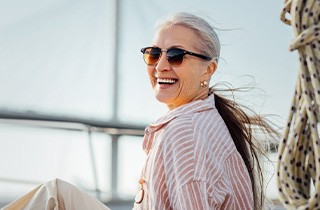 Woman smiling while on a boat