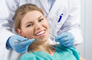 woman getting dental checkup 